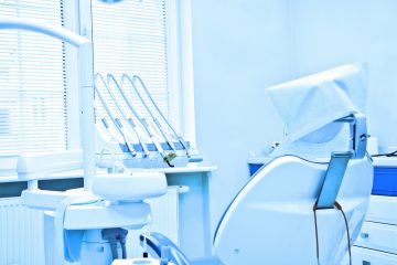 Professional Dentist tools in the dental office. Dental Hygiene and Health conceptual image. Blue image.